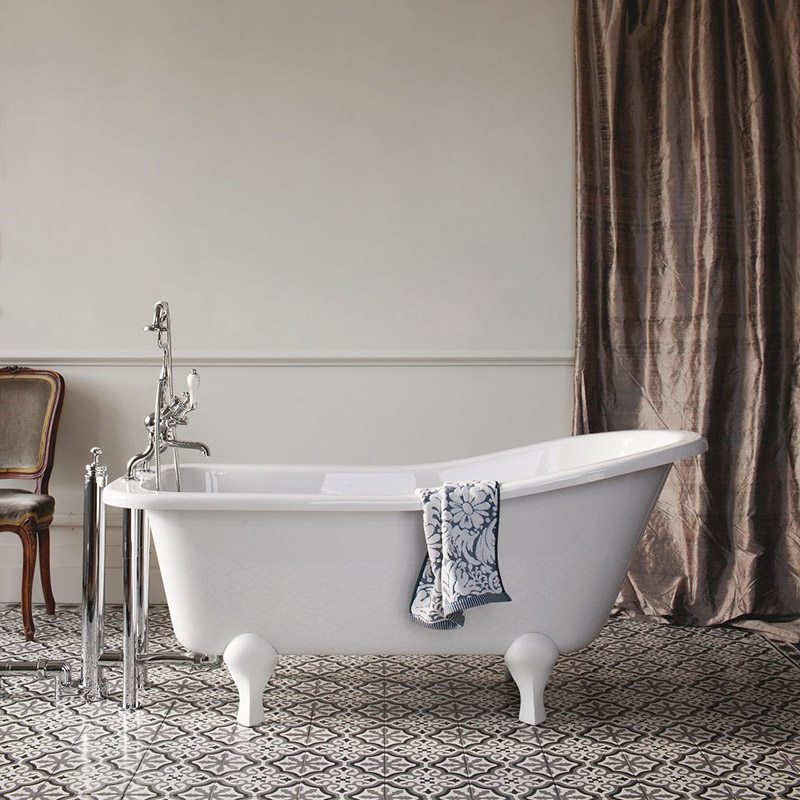 slipper bath on tiled bathroom floor