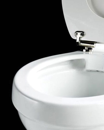 Rimless toilet with close coupled pan and slimline cistern